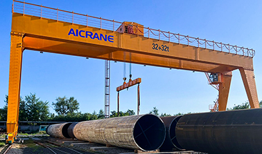 Двухбалочный козловой кран 32+32т для подъема труб в России